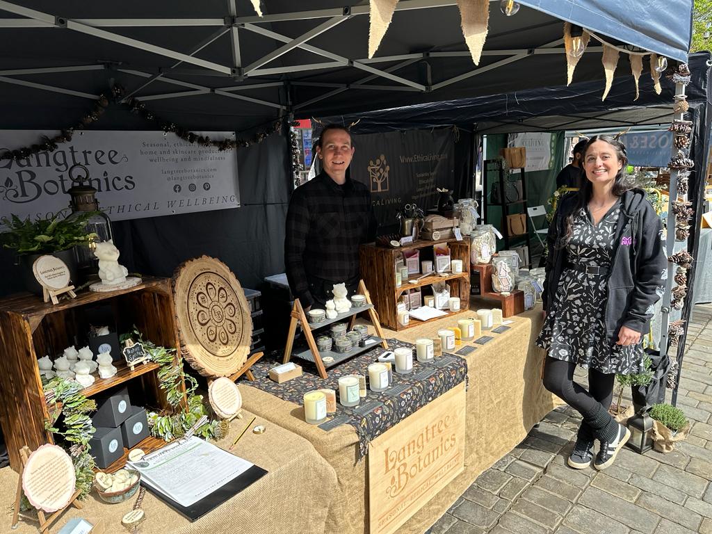 A man and a woman at their market stall in High Wycombe