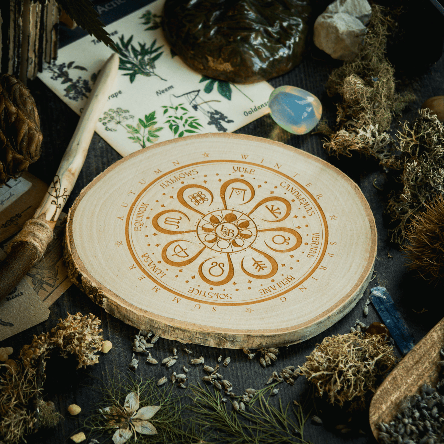 A decorative placemat engraved with a wheel of the year design