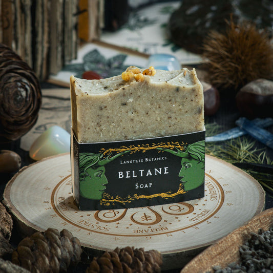 Langtree Botanics natural Beltane soap bar surrounded by seasonal foliage to celebrate Mayday festivities