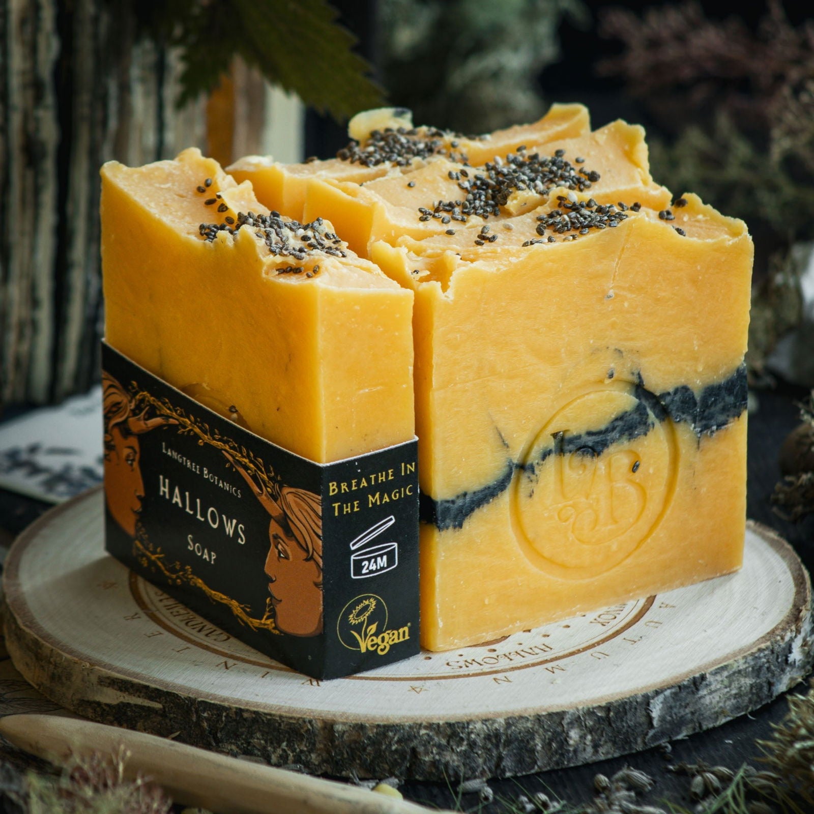 Langtree Botanics bright orange Hallows soap bars surrounded by seasonal foliage celebrating Halloween