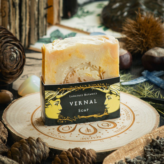 Langtree Botanics natural Vernal soap bar surrounded by seasonal foliage to celebrate the spring equinox and Ostara